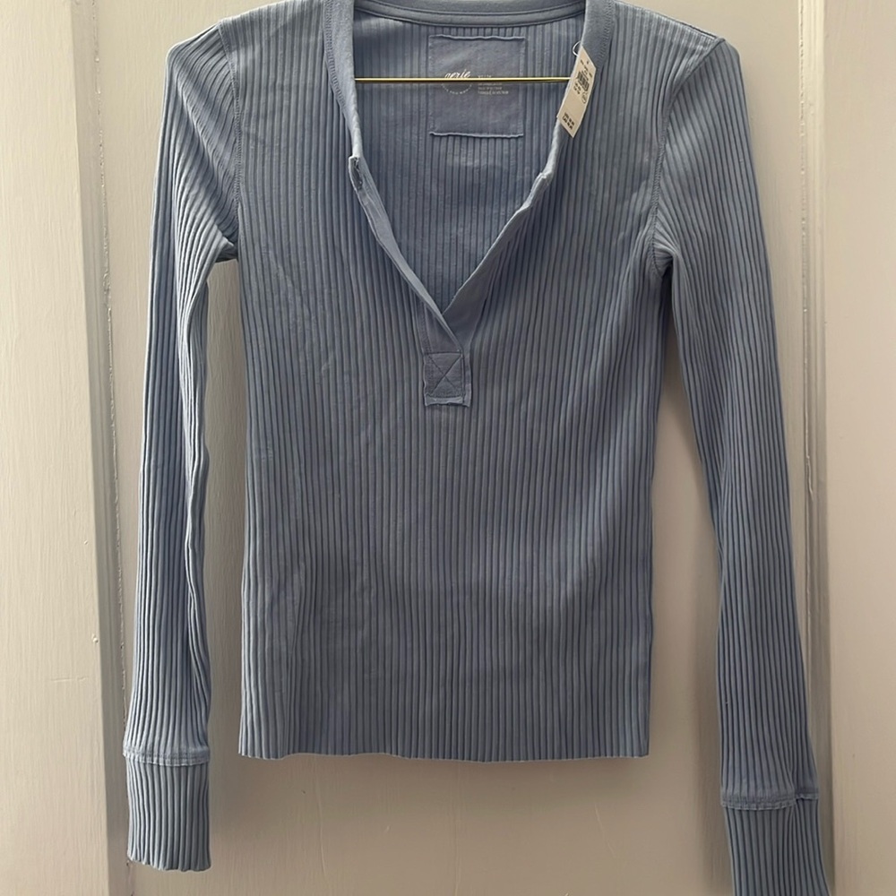 Periwinkle blue ribbed long sleeved top.